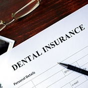 Dental insurance paperwork for the cost of dental implants in Calimesa