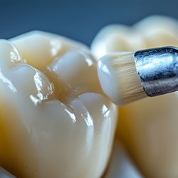 Up-close view of dental sealants being applied