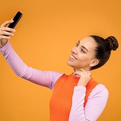 Smiling woman taking a selfie