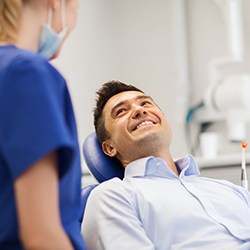 Patient smiling at his Calimesa emergency dentist