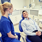 man visiting his dentist for a checkup 