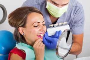 woman getting teeth whitened